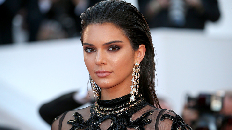 Kendall Jenner Hair: Kendall sports sleeked back hair at the Cannes Film Festival in 2016.