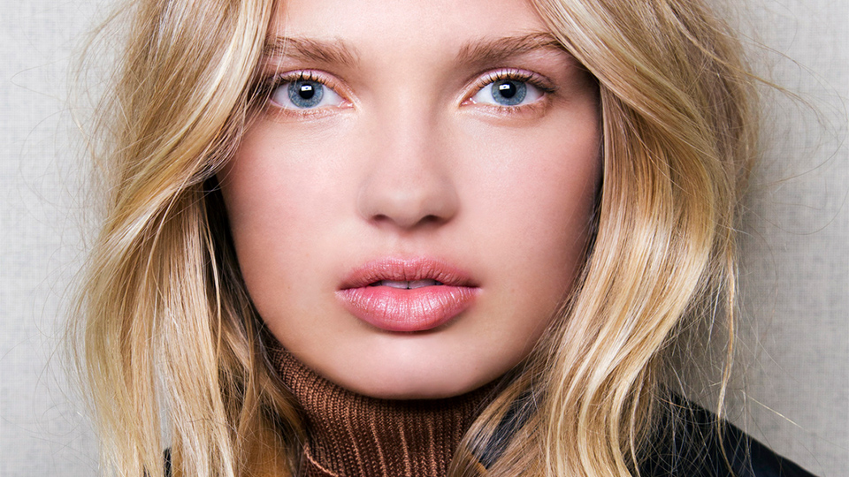 Spraying Texturizer on Wet Hair for Beach Waves