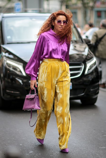 STYLECASTER | How to Wear Clashing Colors | Purple Silk Blouse and Yellow Velvet Pants