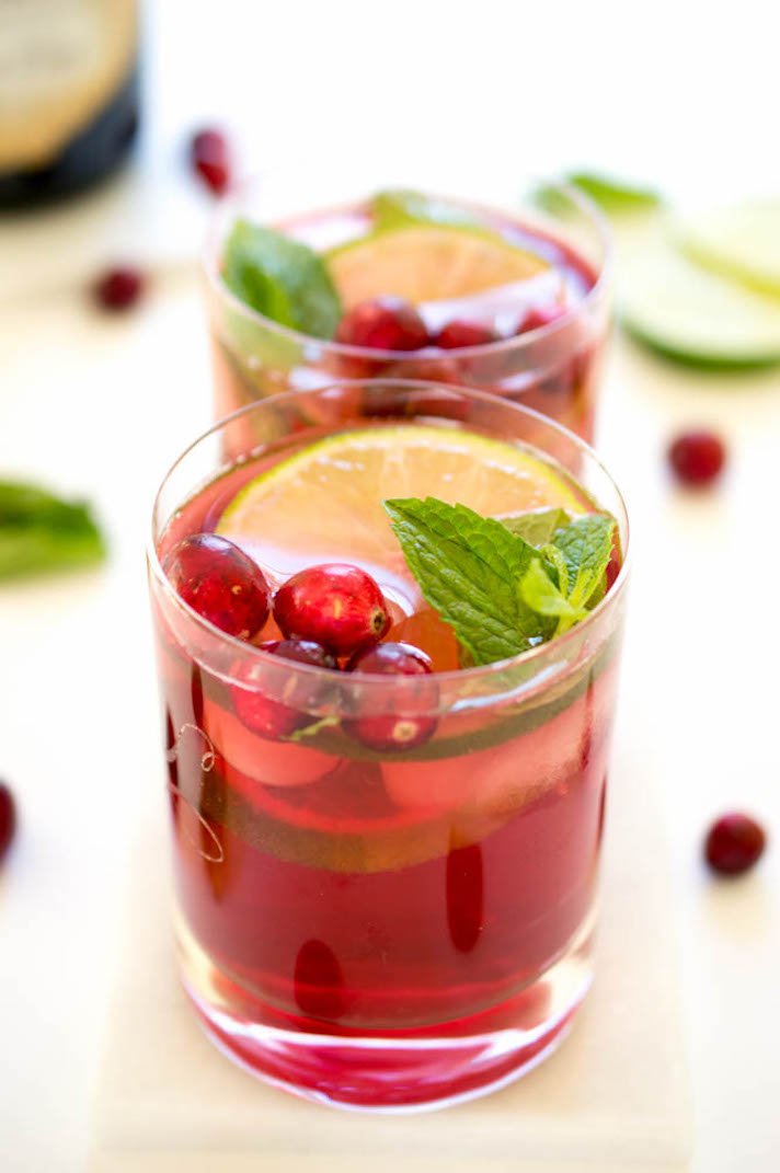 STYLECASTER | 11 Champagne Punch Recipes That'll Make Any Party More Fun | Pomegranate Cranberry Champagne Punch