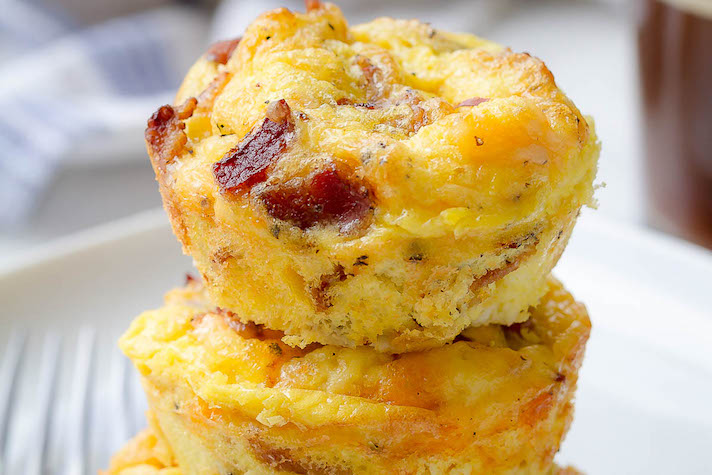 STYLECASTER | 17 Make-Ahead Breakfast Recipes That Make Mornings Much Easier | Cheesy Bacon and Egg Muffins