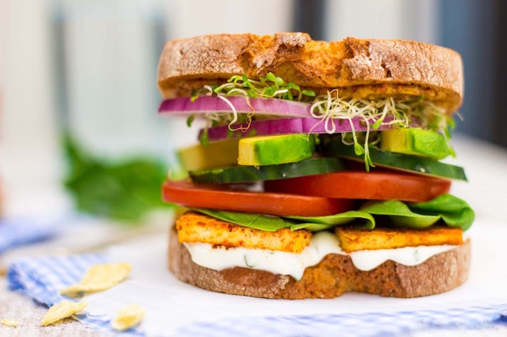 STYLECASTER | 19 High-Protein Veggie Sandwiches That Are Sure To Satisfy | Veggie Sandwich With Smokey Tofu and Lemon-Basil Mayo