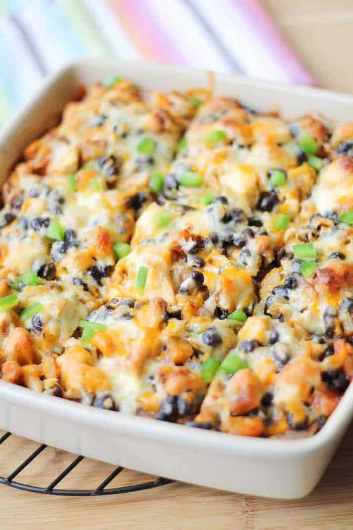 STYLECASTER | Easy Weeknight Chicken Recipes That Are Perfect for Fall | Cheesy Chicken, Butternut, and Black Bean Enchilada Bake