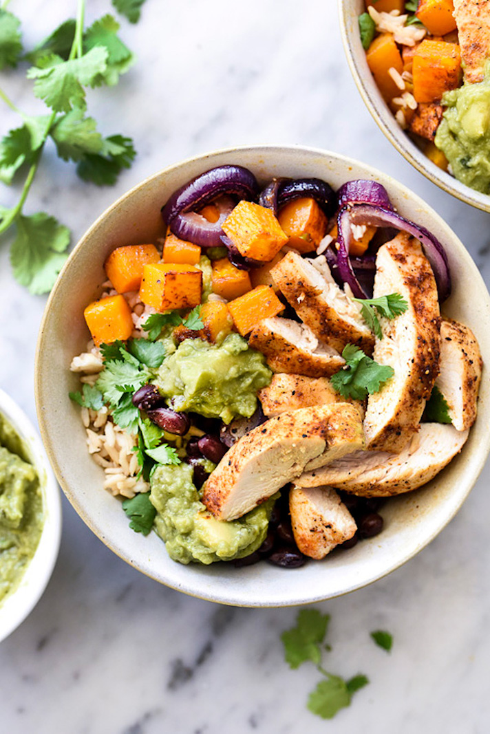 STYLECASTER | Easy Weeknight Chicken Recipes That Are Perfect for Fall | Chicken Enchilada Rice Bowls With Butternut Squash And Guacamole