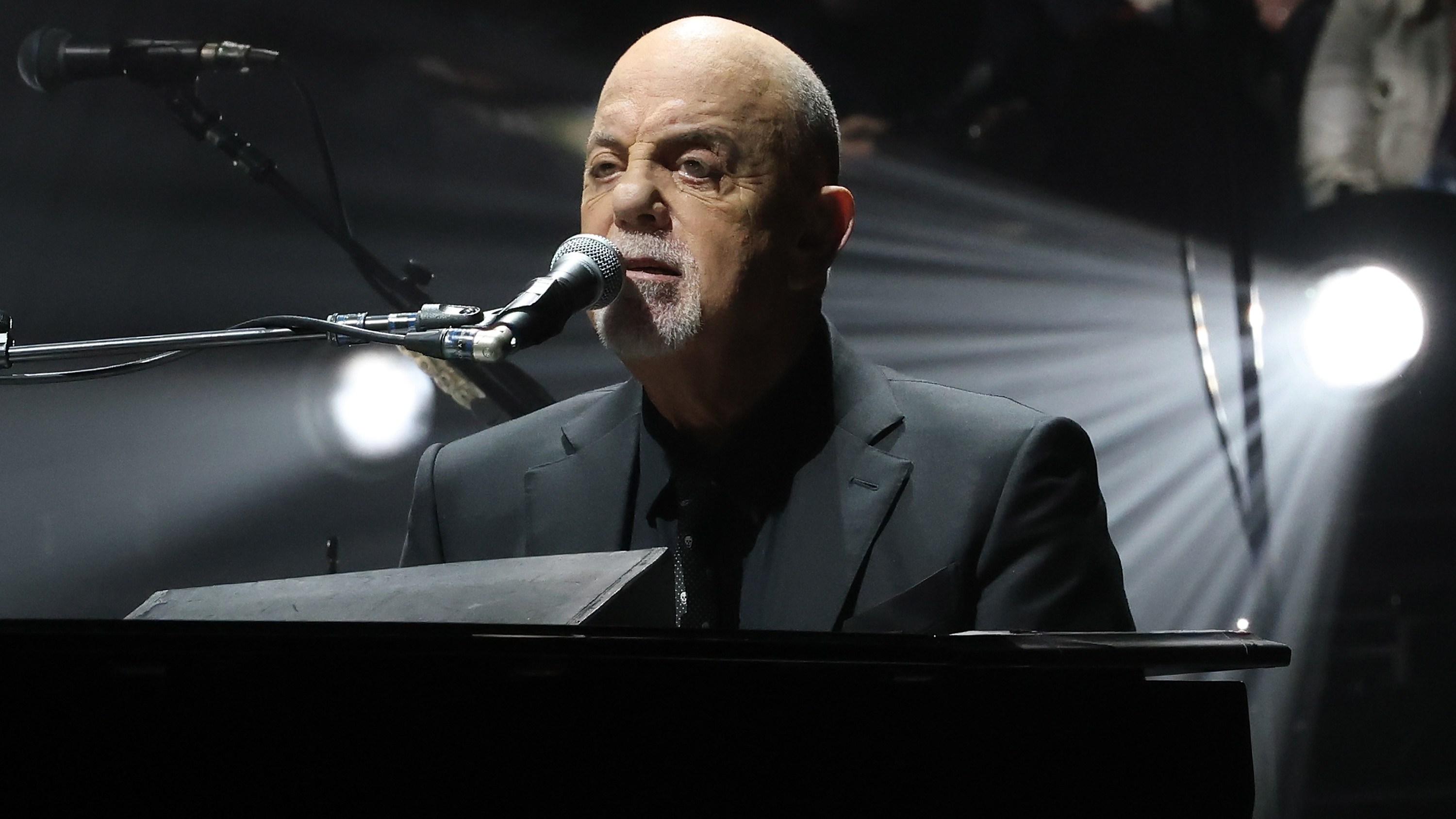 Billy Joel plays piano at Madison Square Garden.