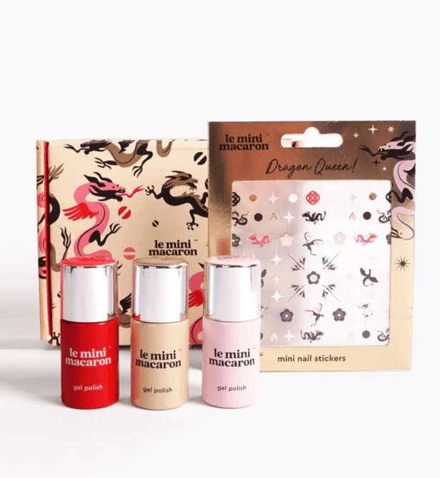 A gift bundle with three gel nail polishes and two sticker sheets from Le Mini Macaron