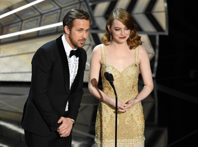 Actors Ryan Gosling (L) and Emma Stone speak onstage during the 89th Annual Academy Awards at Hollywood & Highland Center on February 26, 2017 in Hollywood, California