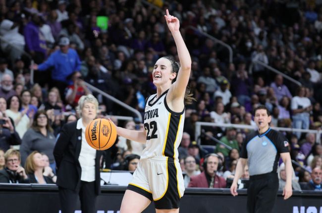 Caitlin Clark #22 of the Iowa Hawkeyes celebrates after the win against the LSU Tigers during the finals of the NCAA Women's Basketball Tournament - Albany Regional at MVP Arena on April 01, 2024 in Albany, New York. 