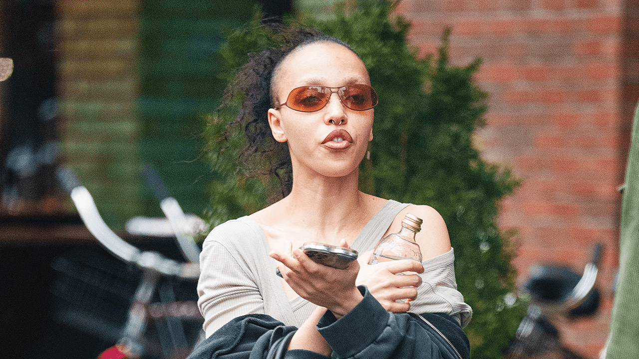 FKA Twigs in NYC with a half-shaven haircut.