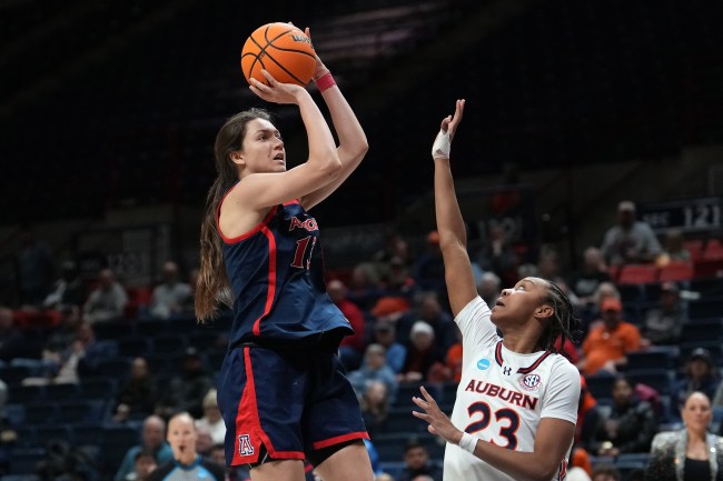 STORRS, CONNECTICUT - MARCH 21: Helena Pueyo #13 of the Arizona Wildcats shoots over Honesty Scott-Grayson #23 of the Auburn Tigers during the second half of a First Four game of the NCAA Women's Basketball Tournament at the Harry A. Gampel Pavilion on March 21, 2024 in Storrs, Connecticut. The Wildcats beat the Tigers 69-59.