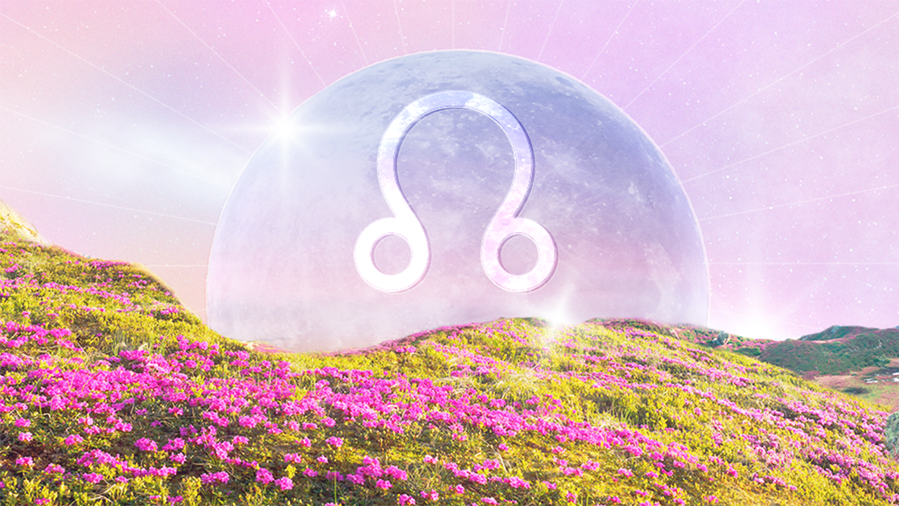 StyleCaster | A full moon with the North Node symbol on top of it rising above a field of pink wildflowers