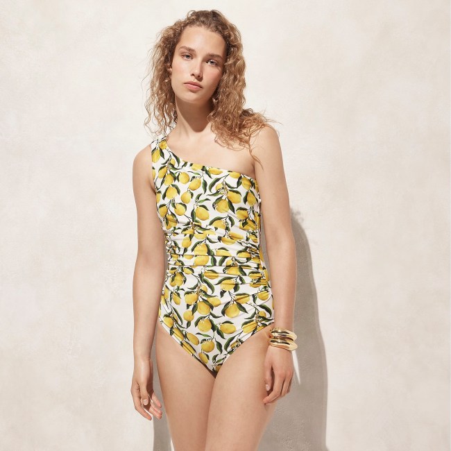 J.Crew model wearing ruched one-shoulder one-piece swimsuit.
