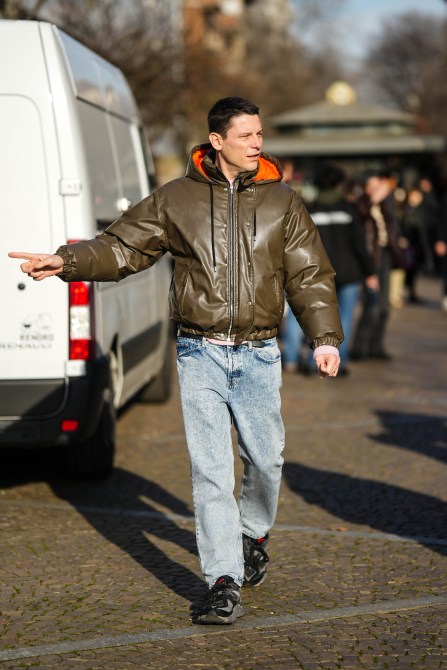 STYLECASTER | Men's outfit, bomber jacket and jeans.