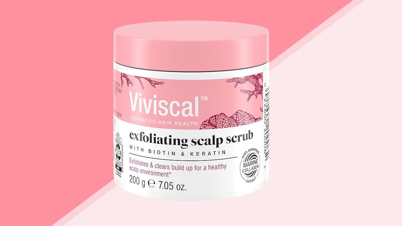 Viviscal Exfoliating Scalp Scrub on a pink striped background