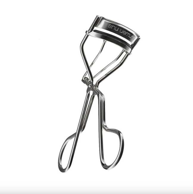 A Silver Shu Uemura Eyelash Curler.