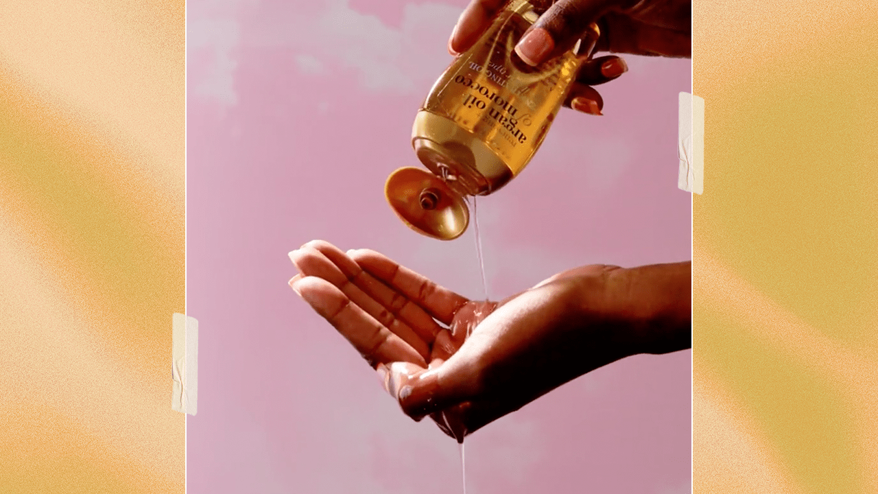 Model pouring OGX's Renewing + Argan Oil of Morocco Penetrating Hair Oil Treatment into her other hand.