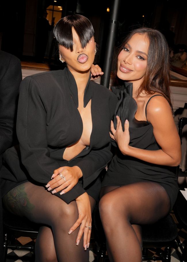Cardi B and a guest at the Mugler show.