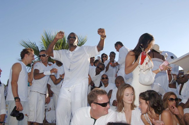 Sean "Diddy" Combs and guest during Sean "Diddy" Combs White Party - Inside at Nikki Beach in St Tropez, France.