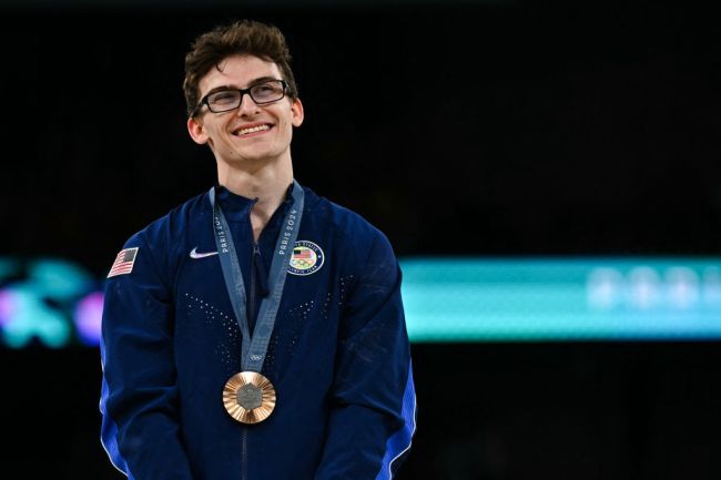 Bronze medallist US' Stephen Nedoroscik celebrates during the podium ceremony for the artistic gymnastics men's pommel horse final during the Paris 2024 Olympic Games at the Bercy Arena in Paris, on August 3, 2024.
