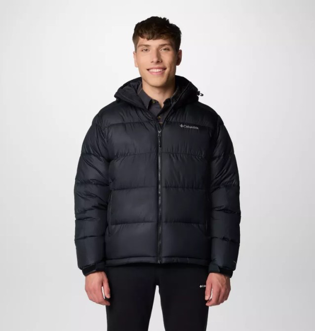 A model wearing the Columbia Men's Pike Lake II Hooded Jacket in black