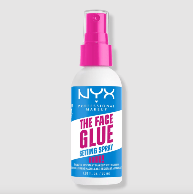 NYX The Face Glue Gripping Setting Spray in a white bottle.