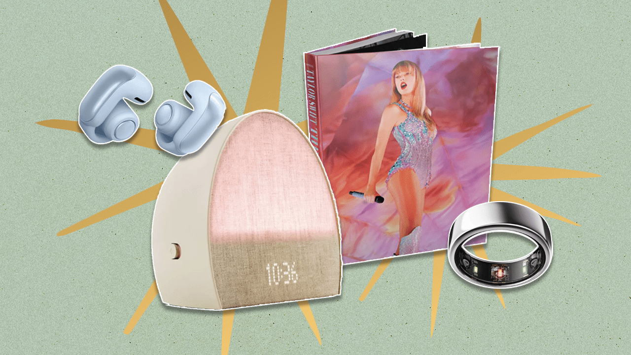 Left to Right: Bose Ultra Open Earbuds in light blue, Hatch Restore 2 smart alarm clock, Taylor Swift Eras Tour book, Oura Ring Gen3 Horizon in silver
