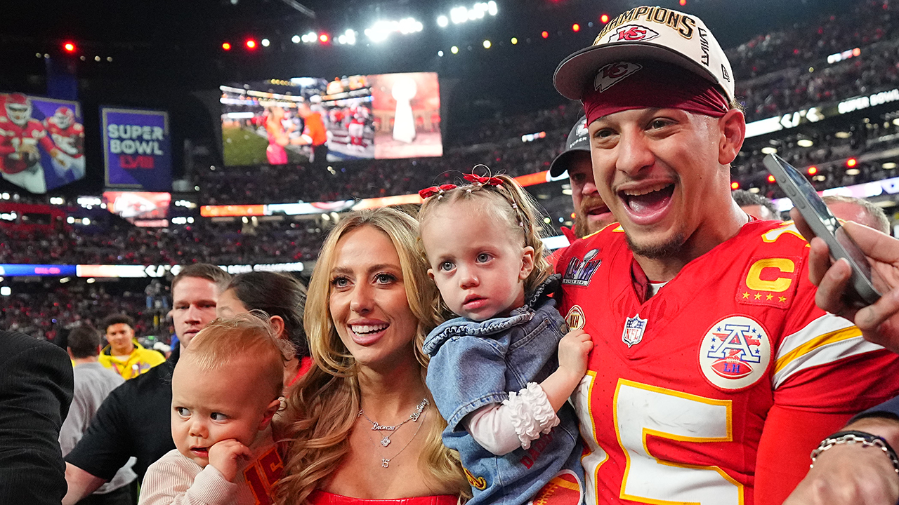 Football: Super Bowl LVIII: Kansas City Chiefs Patrick Mahomes (15) poses with wife Brittany Mahomes and their children Patrick Bronze and Sterling Skye following victory vs San Francisco 49ers at Allegiant Stadium. Las Vegas, NV 2/11/2024 CREDIT: Erick W. Rasco