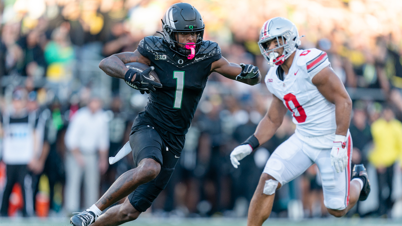 EUGENE, OREGON - OCTOBER 12:  Wide receiver Traeshon Holden #1 of the Oregon Ducks carries the ball during the first half of the game against the Ohio State Buckeyes at Autzen Stadium on October 12, 2024 in Eugene, Oregon.