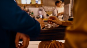 A couple sharing a drink