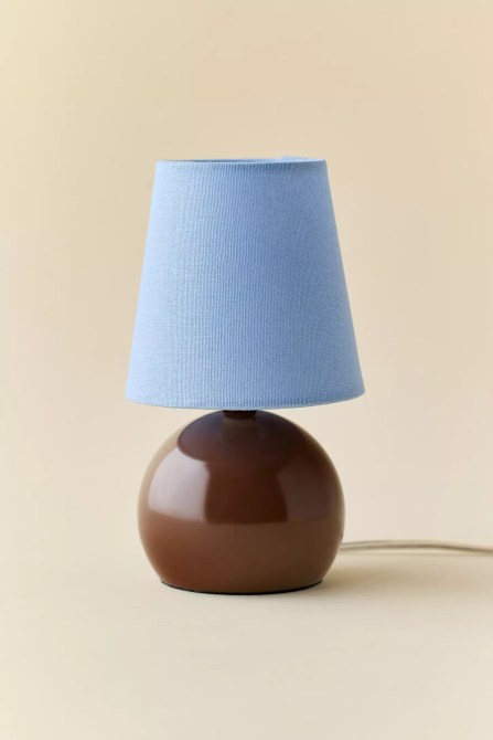 A brown and blue table lamp