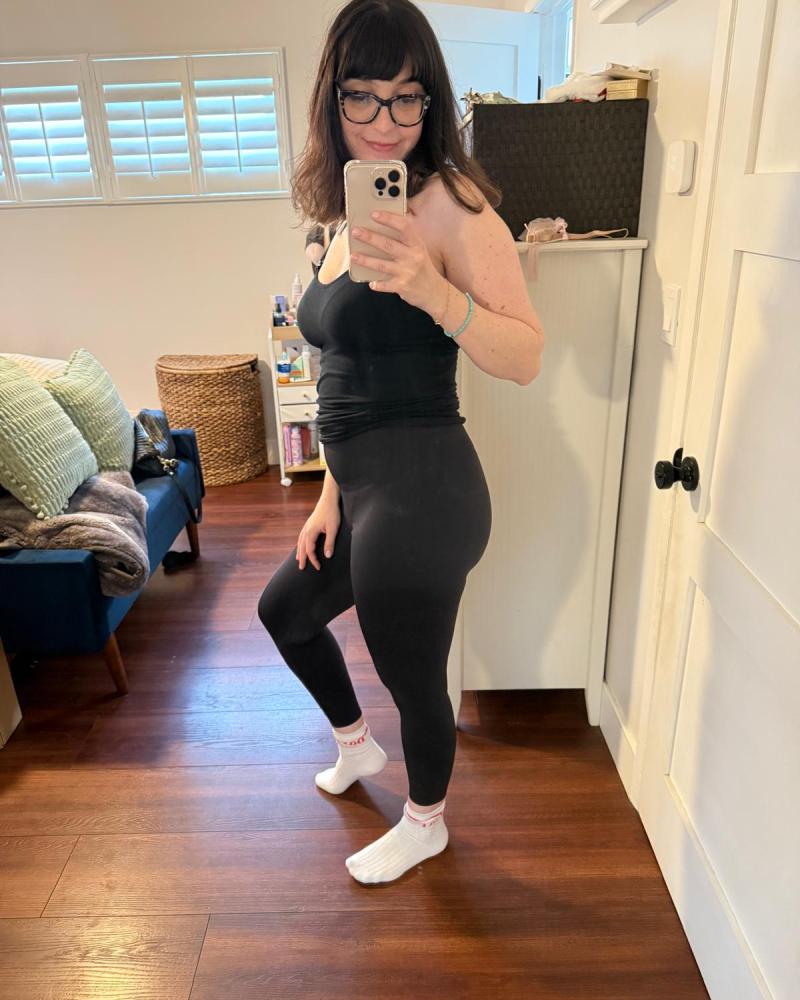 Gina wearing the Lululemon Glow Up Super-High-Rise Tight 25" in the black colorway