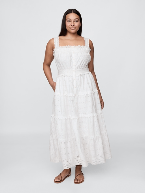 A model wearing the Gap x Dôen Eyelet Maxi Dress in white