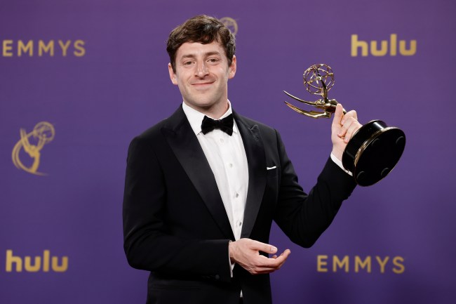 LOS ANGELES, CALIFORNIA - SEPTEMBER 15: Alex Edelman, winner of the Outstanding Writing for a Variety Special for “Alex Edelman: Just for Us”, poses in the press room during the 76th Primetime Emmy Awards at Peacock Theater on September 15, 2024 in Los Angeles, California.