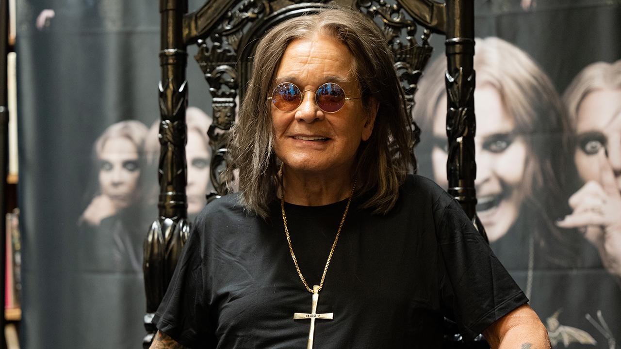 LONG BEACH, CALIFORNIA - SEPTEMBER 10: Musician Ozzy Osbourne signs copies of his album "Patient Number 9" at Fingerprints Music on September 10, 2022 in Long Beach, California.