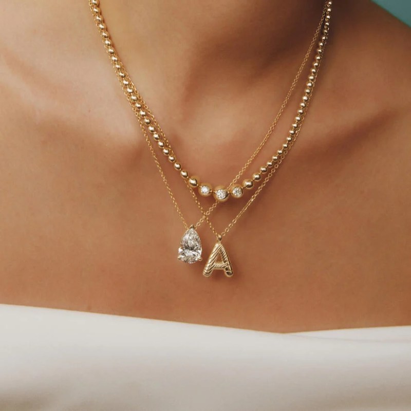 How to Layer Necklaces According to a Stylist