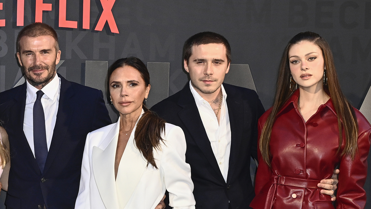 LONDON, ENGLAND - OCTOBER 03: (L-R) Mia Regan, Romeo Beckham, Cruz Beckham, Harper Beckham, David Beckham, Victoria Beckham, Brooklyn Peltz Beckham and Nicola Peltz Beckham attend the Netflix 'Beckham' UK Premiere at The Curzon Mayfair on October 03, 2023 in London, England.